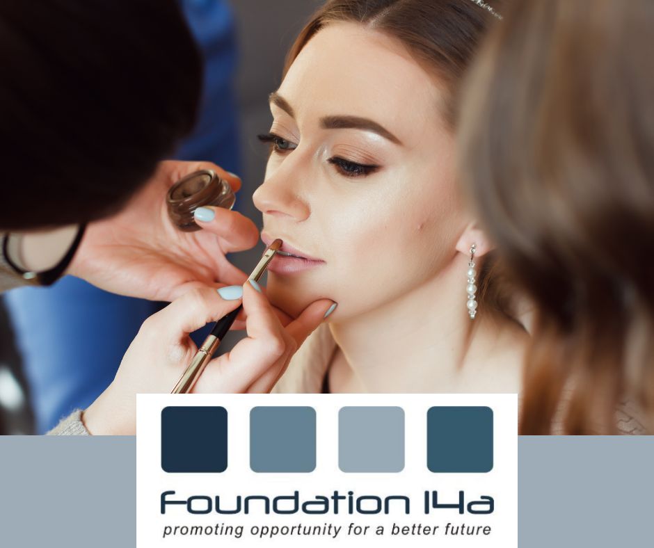 Close up of a lady having makeup applied by a professional