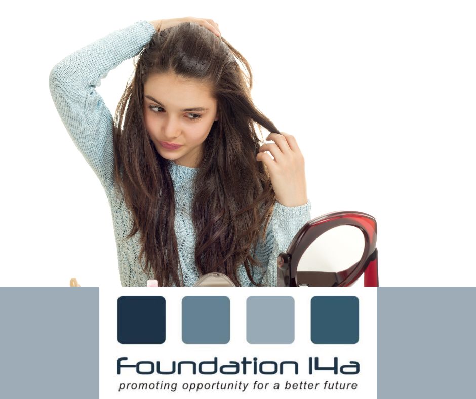 make-up masterclasses - a young teenage girl with long brown wavy hair sits in front of a mirror