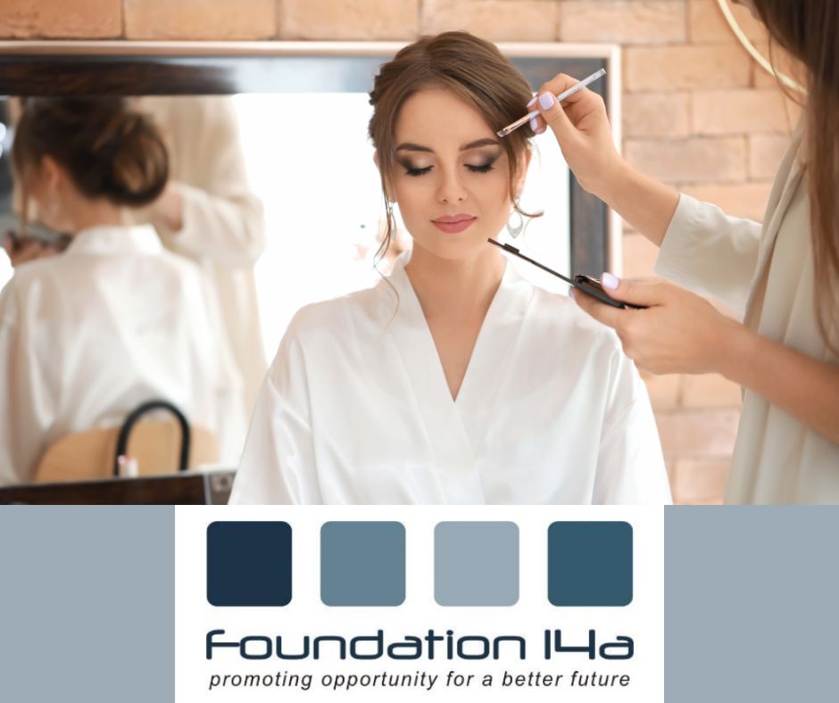 make-up masterclasses - a model sits in a white robe having make-up applied