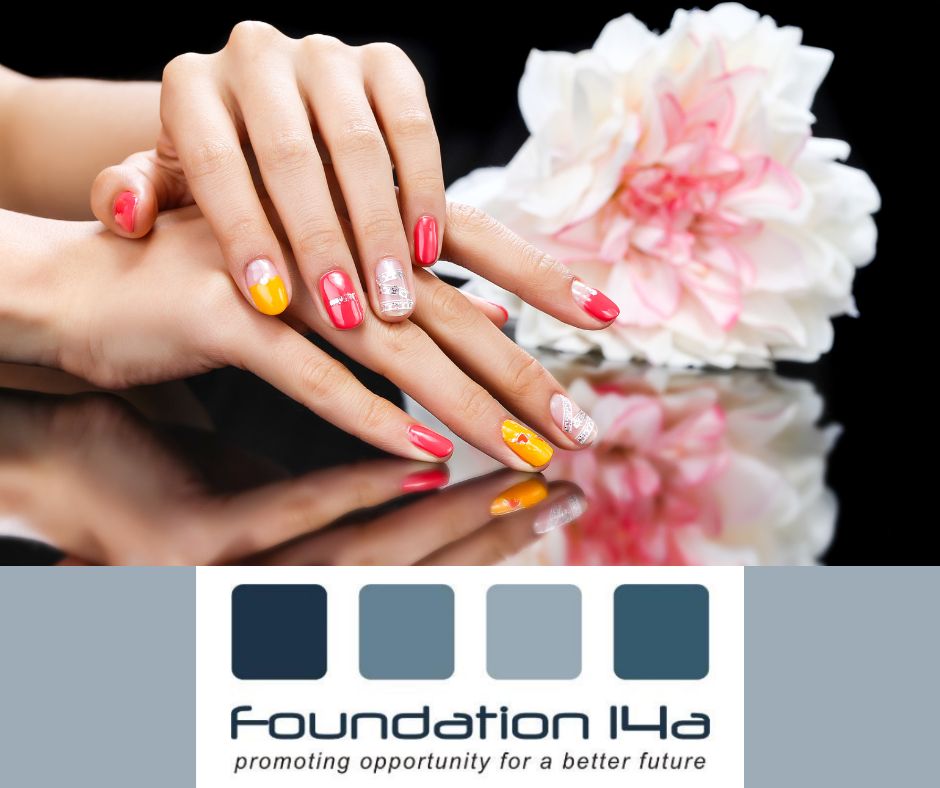 Intensive Beauty Courses - a lady's hand with beautiful nail art is reflected in the shiny mirrored surface, with a pink/white large flower in the background.