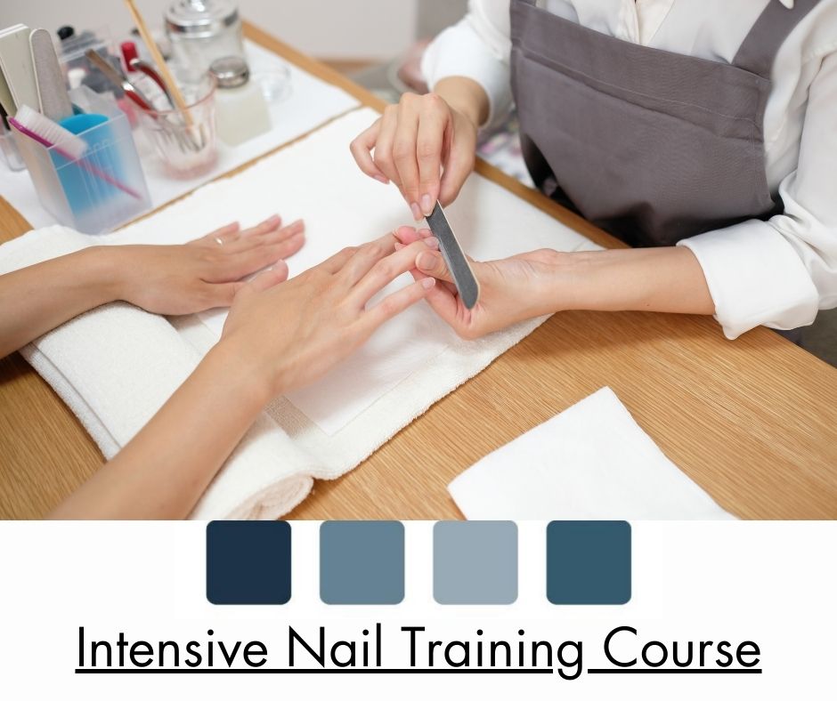 Nail Training Courses - an overhead view of a nail technician with a grey tabard filing the nails of her client's hands