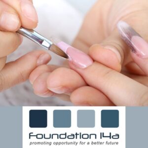 Close up of a lady's hand receiving treatment on a acrylic liquid and powder nail course