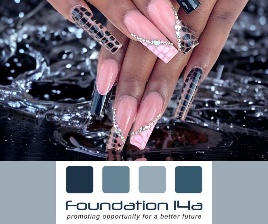 Close up of Black lady's hands with intricate nail art taught on the acrylic liquid and powder nail course