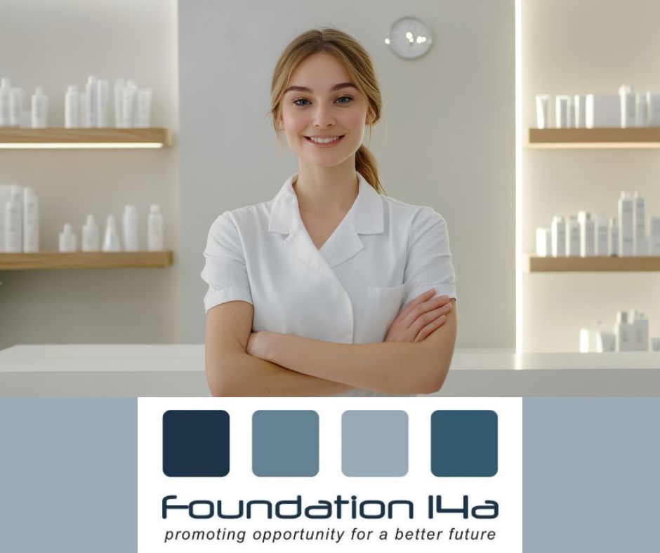 Foundation 14a - a young blonde female in a white uniform is standing in a beauty salon smiling