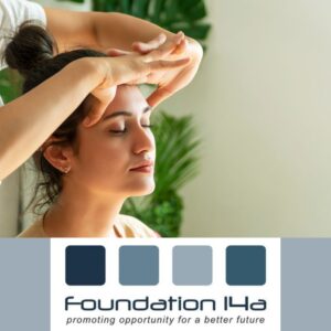 Indian Head Massage Course - a lady sitting with her eyes closed, relaxed as a therapist massages her head.