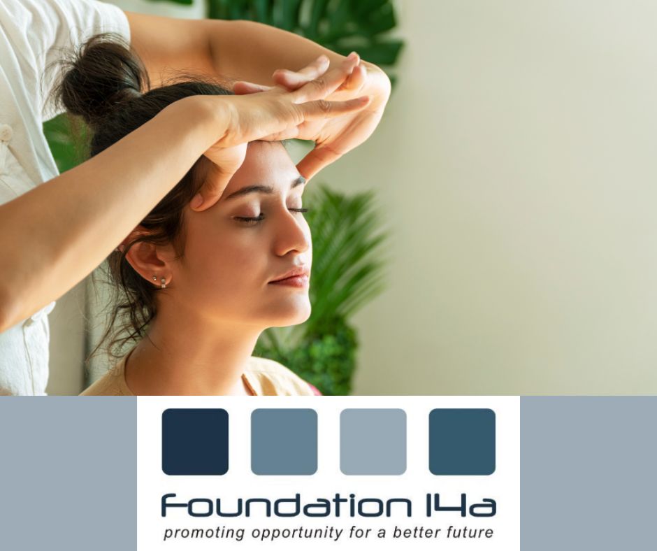 Indian Head Massage Course - a lady sitting with her eyes closed, relaxed as a therapist massages her head.