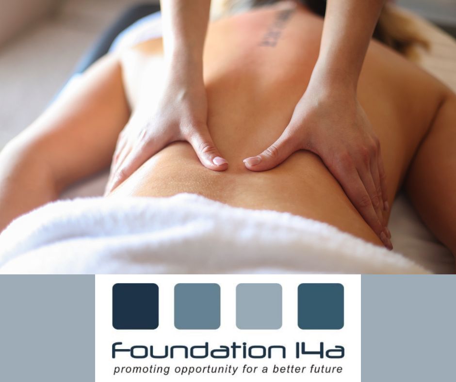 Swedish body massage course - a close up of a female's back with hands massaging it